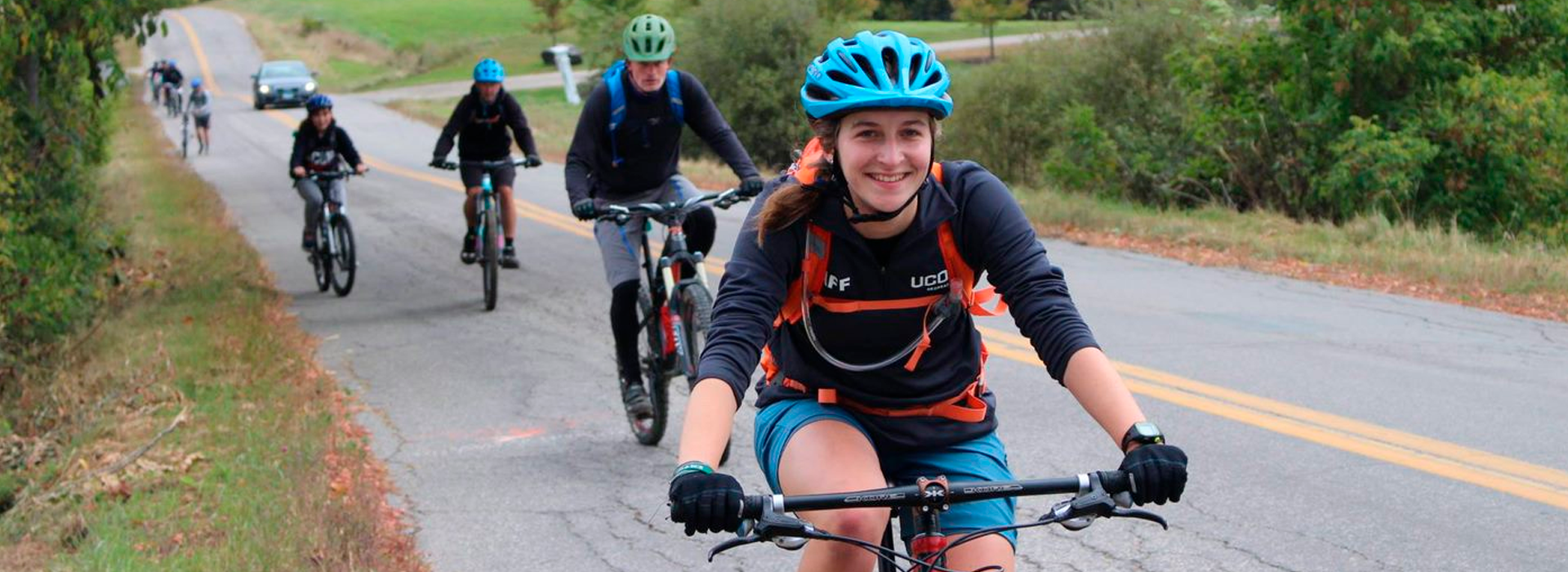 students riding bicycles